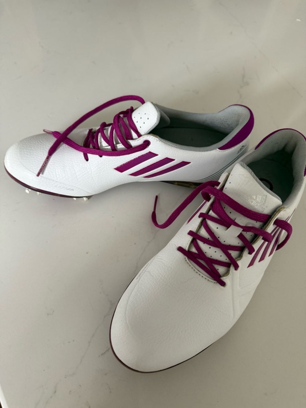 adidas Women's White and Magenta lace up
Golf shoes